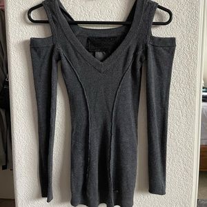 Long sleeve grey top with open shoulders.